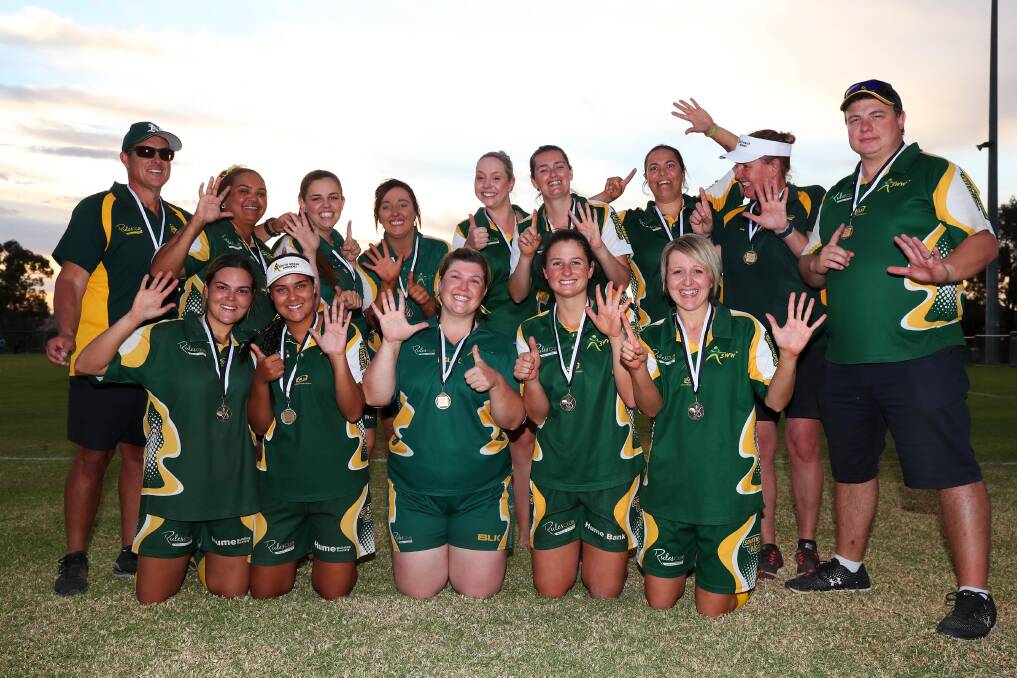 SIX AND COUNTING: South Wagga Warriors celebrate their Wagga Softball premiership.