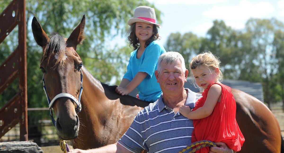 Rob Garrett, pictured with his granddaughters Taylor and Milla and Mitayorbelle, has Tearsonmypillow looking to make it two wins in a row at Leeton on Tuesday.
