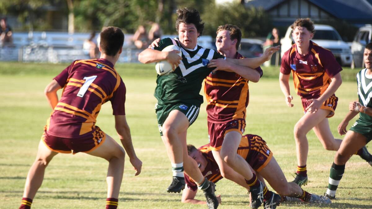 BACK IN FORM: Charlie Corcoran looks to bring down Western's Jack Hartwig in Riverina's loss to start the Laurie Daley Cup last week. They hit back to down Penrith on Sunday.