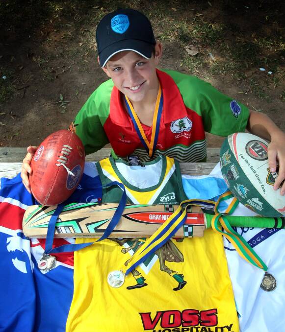 GRAND FINAL KING: Pat Voss, 12, has enjoyed unprecedented success wining premierships in Aussie rules, rugby league, touch and cricket this season as well as a number of individual honours. Picture: Les Smith