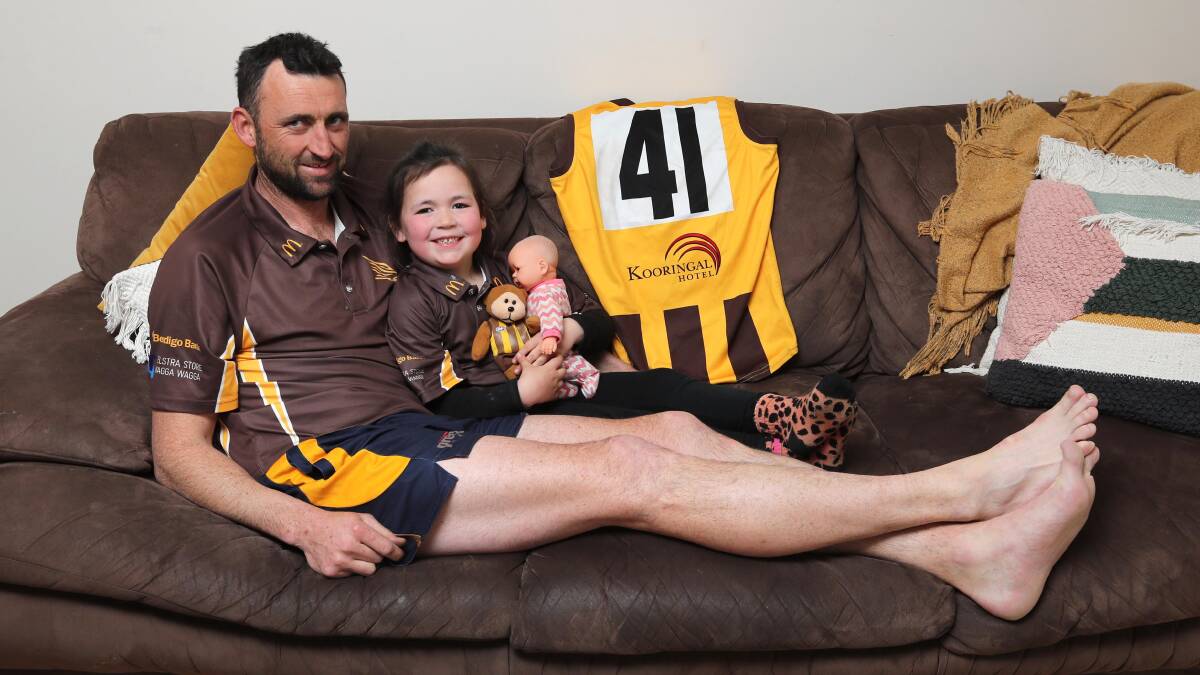 MILESTONE MAN: Brenton Roberts relaxes with daughter Olivia, 4, ahead of the Farrer League grand final which will be his 250th first grade game for East Wagga-Kooringal on Saturday. Picture: Les Smith