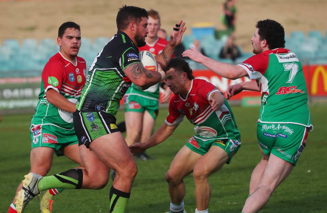 CHARGING THROUGH: Jon Huggett scored a second half double to help Albury to a 30-12 win over Brothers on Saturday. Picture: Emma Hillier