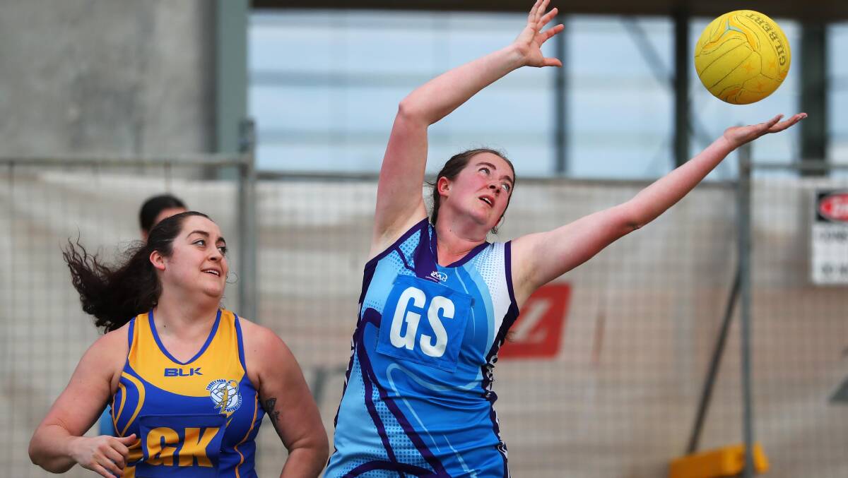 REACHING HIGH: Goal shooter Cloe Hildebrand goes up high for a ball in New Kids Aces win over Turvey Park on Saturday. Picture: Emma Hillier