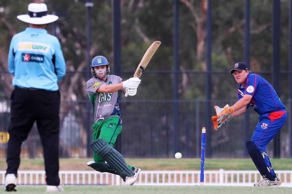TOP KNOCK: Jon Nicoll gets the ball away during Wagga City's rain-affected win over St Michaels at Robertson Oval on Monday night. He made an unbeaten 54. Picture: Emma Hillier