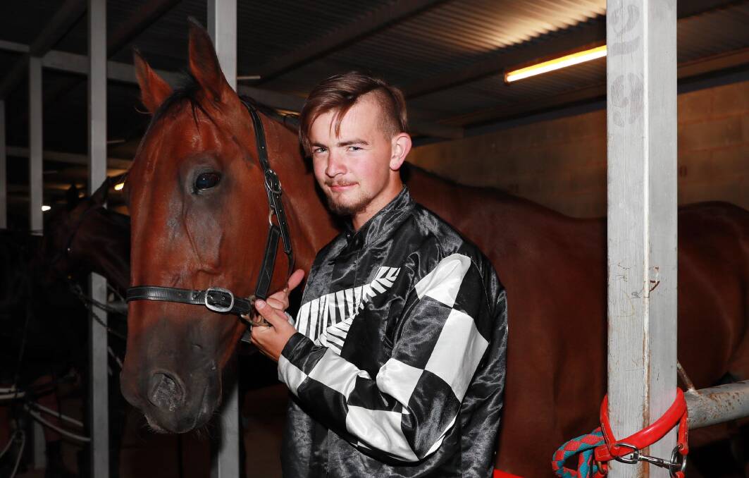 MILESTONE MOMENT: Damon Watson scored his first win as a driver after Nippers Grin scored at $81 at Leeton on Friday night. Picture: Les Smith