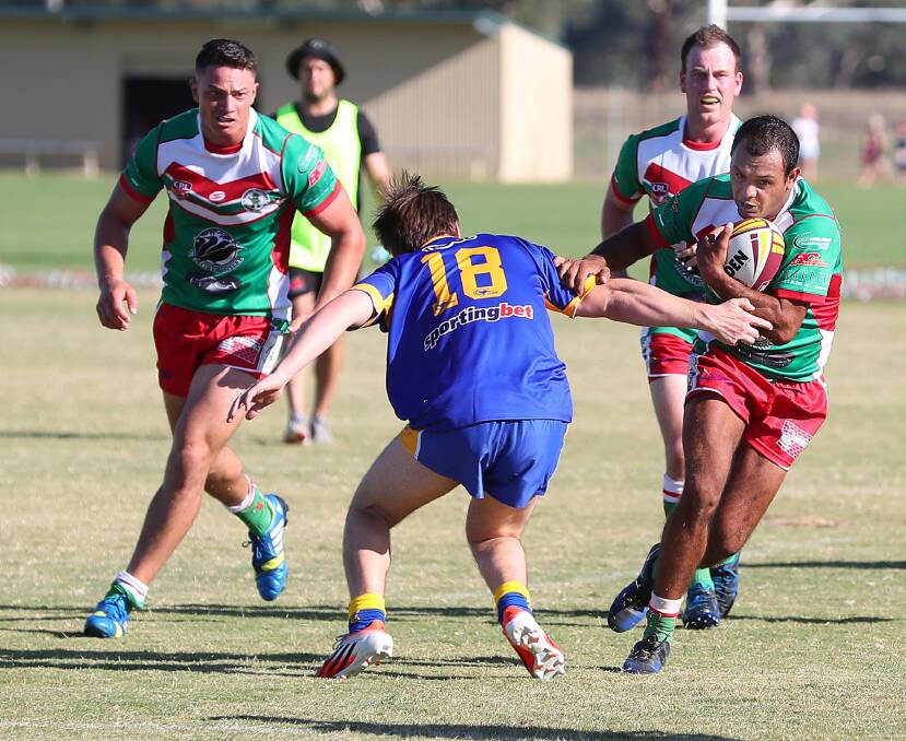 SLIPPERY: Harold Kirby looks to slice pass a Coogee Dophins rival during the Brothers win in the Dave Mavroudis Shield. Picture: Kieren L Tilly