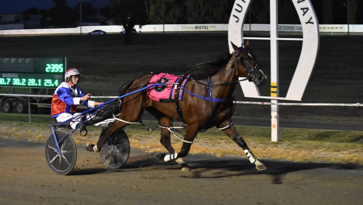 TAKING IT OUT: Amanda Turnbull guides Fasika to victory in the Junee Pacers Cup on Tuesday night. It was one of three training wins for the Bathurst horsewoman. Picture: Courtney Rees