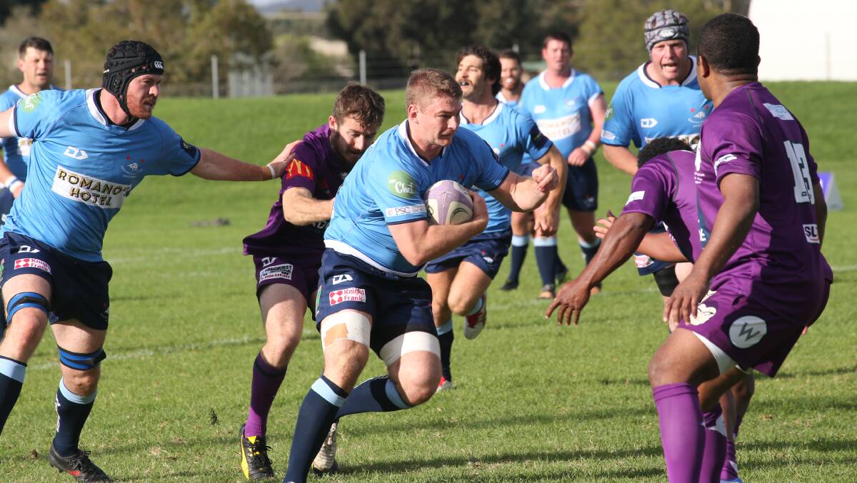 CHARGING FORWARD: Sam Bunny brings the ball up for Waratahs in their win over Leeton at Leeton No.1 Oval on Saturday. Picture: Anthony Stipo