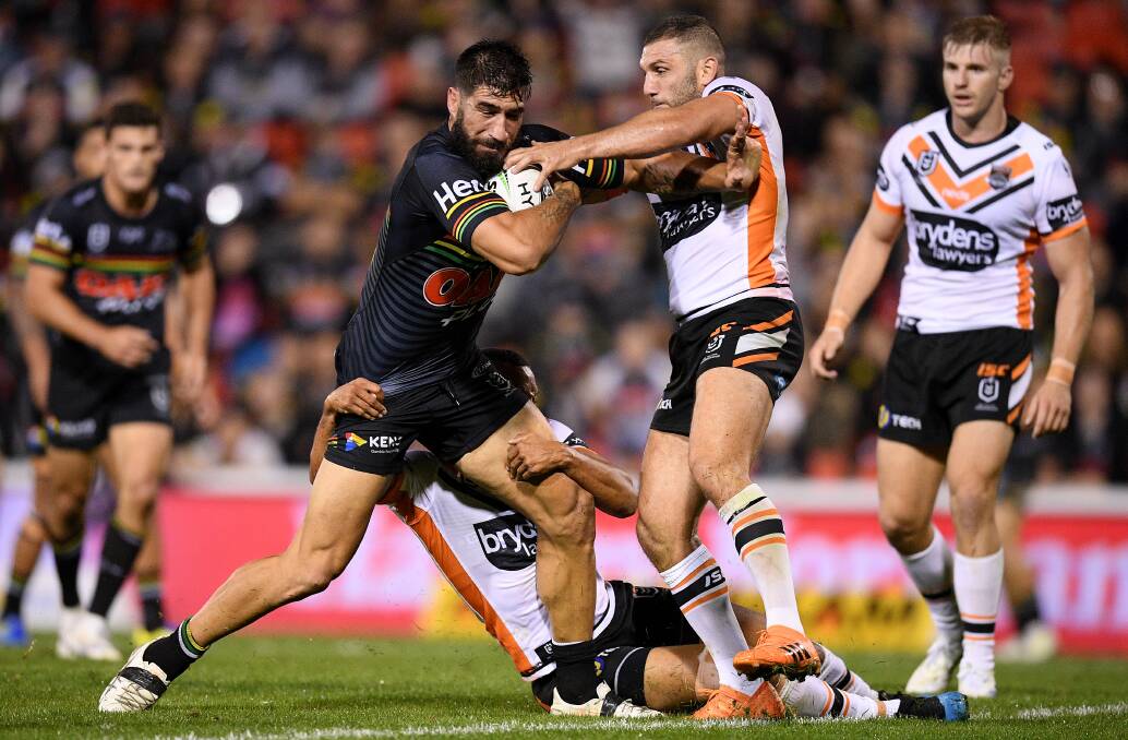 BIG CLASH: James Tamou, picturing trying to get out of a tackle from Robbie Farah, is hoping Penrith can deliver a much needed win against Canberra at Equex Centre on Saturday.