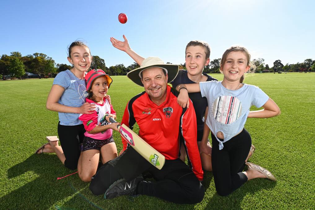 TEAMWORK MAKES THE DREAM WORK: Ben Farnsworth with his children and biggest supporters Olivia, 11, Mia, 7, Tyler, 13, and Mikaela, 9, at Howlong's cricket club, where Mr Farnsworth is now back playing. Picture: MARK JESSER