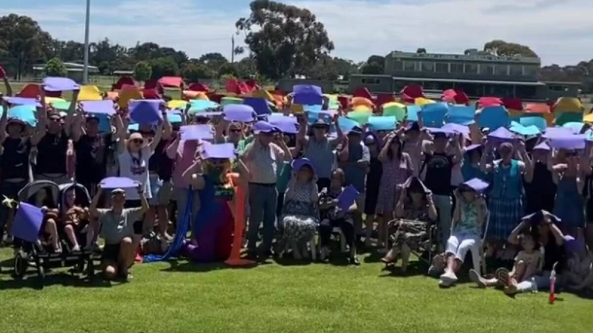 Hay secured a national record for the biggest human rainbow during its 2022 Mardi Gras celelbrations with 446 people particpating. Picture supplied 