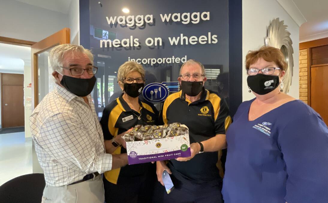 
Wagga Meals on Wheels president John Craig with Wagga Lions Club members Dianne and Bob Smith and Wheels on Meals Wagga manager Julie Logan. Picture: Taylor Dodge