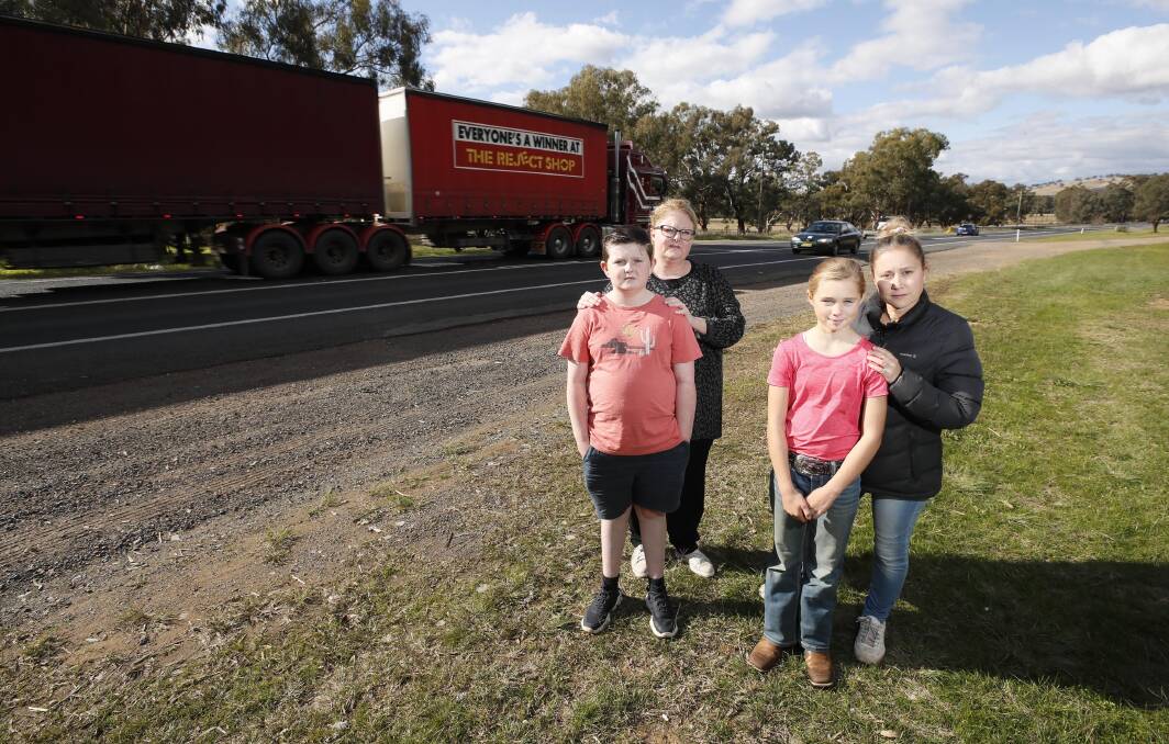 URGENT: Alisa Scanlan with son, Cooper, 12, and Allana Lander with daughter Shayla, 10, at a crash site on Sturt Highway. Picture: Les Smith