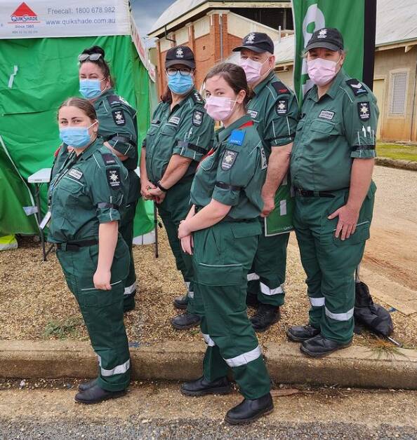 St John's Ambulance Wagga Division superintendent Leia Thiele (back row, second from the left) joined volunteers in paying tribute to Queen Elizabeth II. Picture supplied 