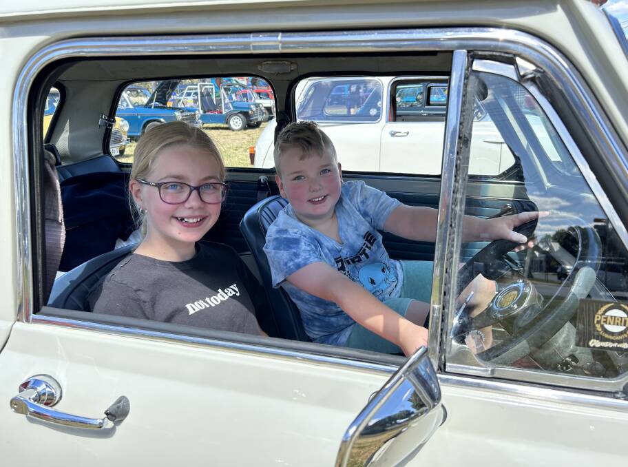 Jayla Gray, 11, and Jax Gray, 8, enjoy a cool seat in Phil Hoey's Mini K at the Mini Muster on the weekend. Picture by John Gray 