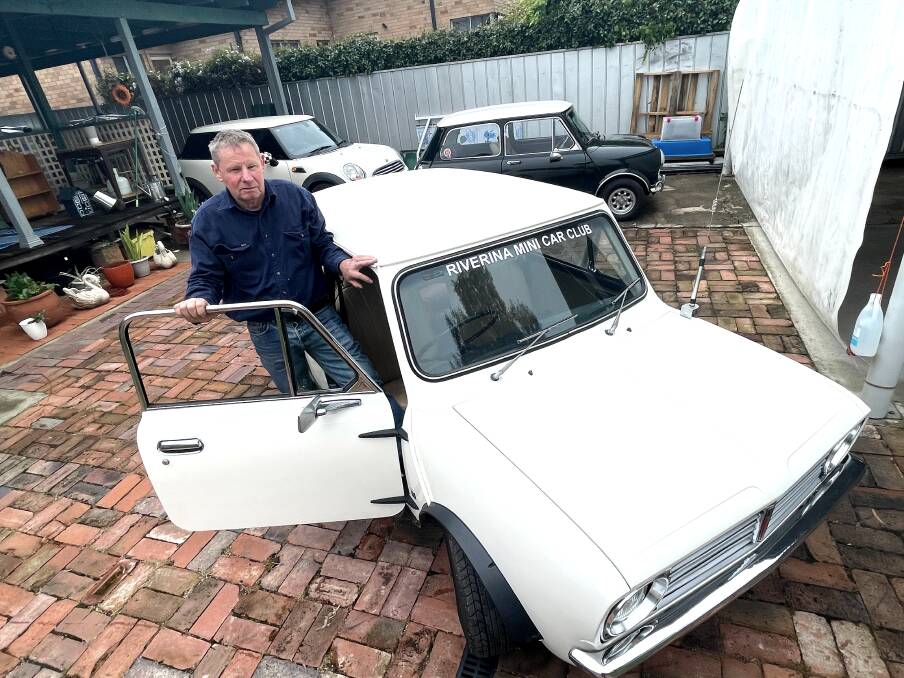 RMCC president Phill Bell with his favourite of four Mini automotives, a white Leyland Mini made in Australia. Picture by Taylor Dodge
