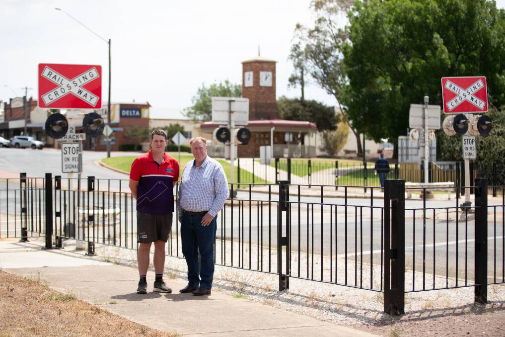 Coolamon's Liam Armstrong and Coolamon Mayor David McCann have raised concerns around the town's rail crossing. Picture by Madeline Begley