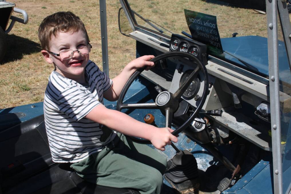 Elliott Greenhill, 4, was able to test out the driver's seat in John Forrest's Moke. Picture by John Gray 