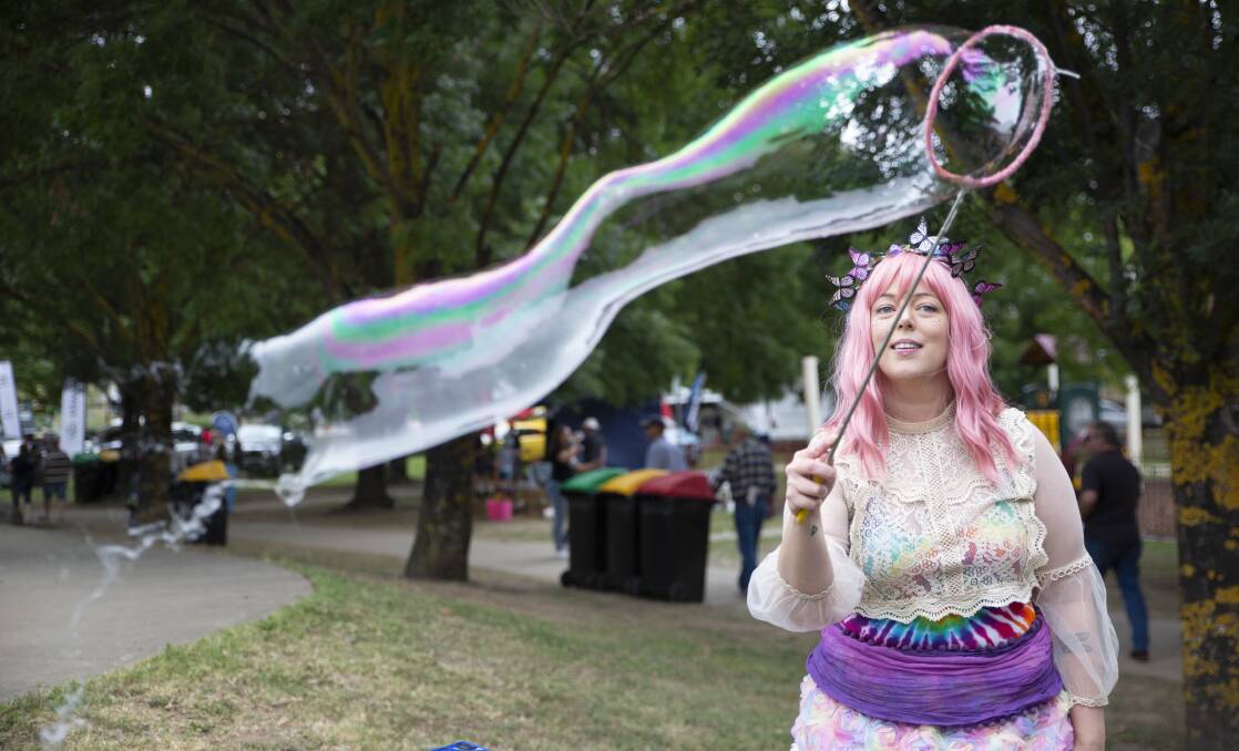 ART ON DISPLAY: Wagga bubble artist Amber Murrary from Tailfeather Art at Tumbafest 2022. Picture: Madeline Begley 