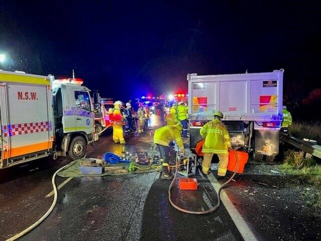 ON SCENE: Fire and Rescue NSW, the Volunteer Rescue Association and NSW Ambulance with police at the scene of a two-truck crash on the Sturt Highway on Monday night. Picture: Stewart Alexander/FRNSW