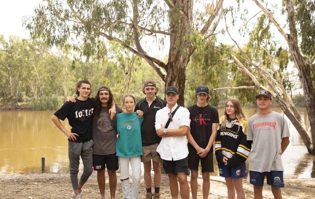 Friends and family gathered at Wagga Beach to pay tribute to Kai Flagg-Stevens, a 19-year-old who died in a collision on Saturday night (L-R): Josh Prowse, Jarrod Kemp, Phoebe Duncombe, Joe Gowland, Jordan Passlow, Zac Dehaan, Lily Flagg-Stevens and Connor Parkin. Photo: Madeline Begley