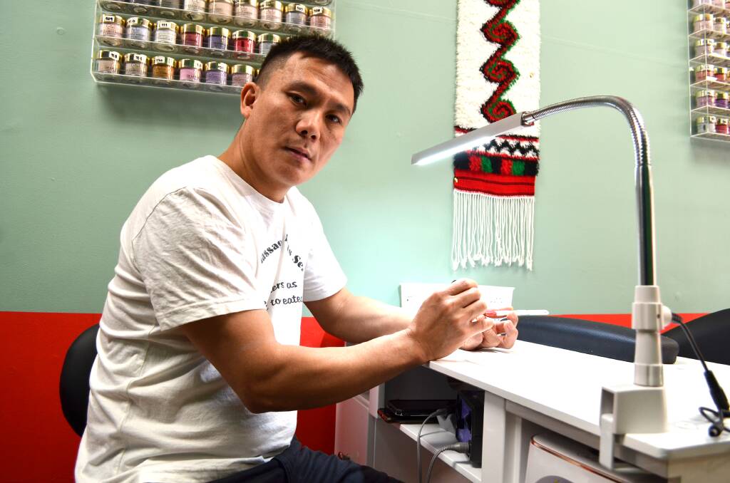  Burmese Massage and Nails Service owner Robert Gumring is hoping to sell his Baylis Street business in a bid to secure the money needed to help rescue his family. Picture by Taylor Dodge