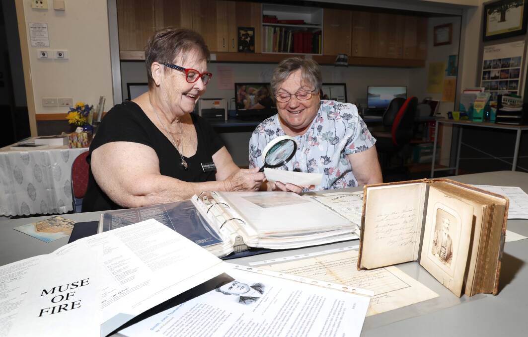 OPEN: Latter-Day church Family History Centre consultants Margaret Foster (L) and Kathryn Jensen are ready to reopen. Picture: Les Smith 