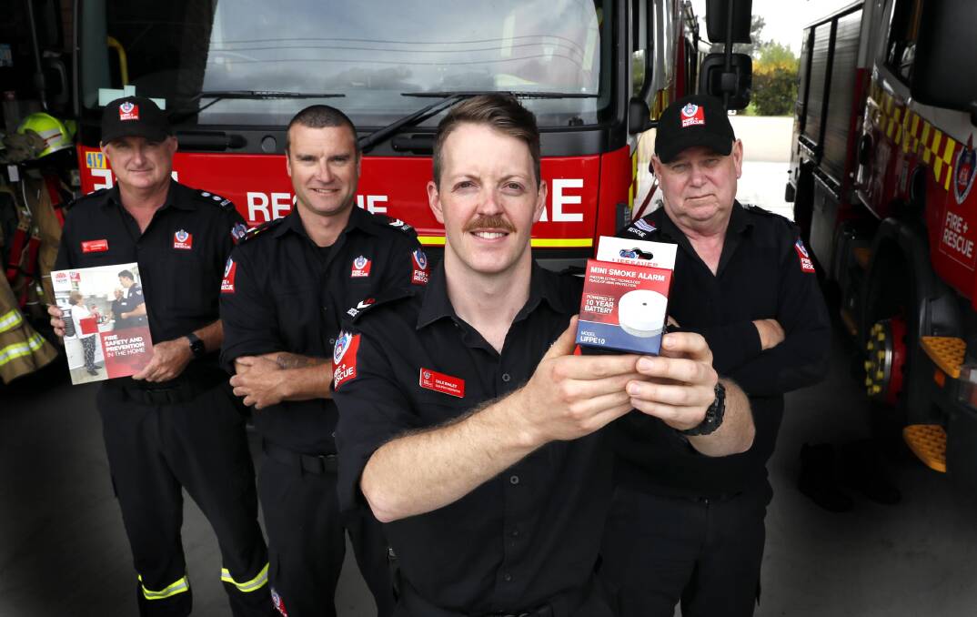 SAFETY FIRST: Fire and Rescue NSW Turvey Park station officer Justin Bentley with Matt Holliday, Zale Bailey and Neil Trezona. Picture: Les Smith 