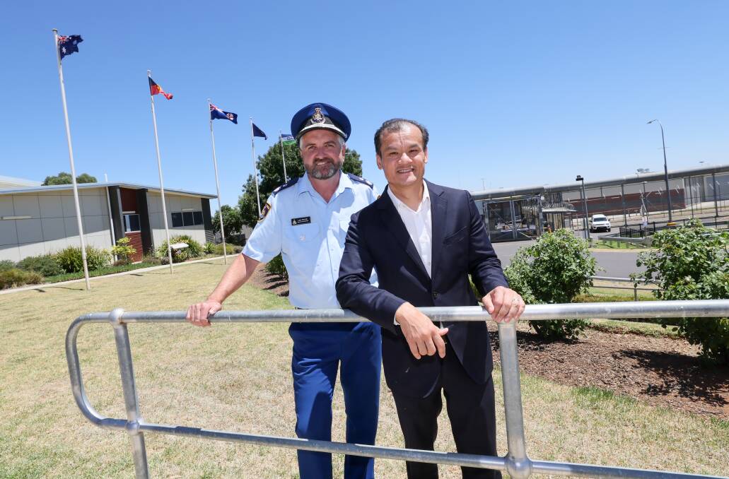 Minister for Corrections Anoulack Chanthivong and Corrective Services deputy commissioner Leon Taylor at the Junee Correctional Centre on Wednesday. Picture by Les Smith 