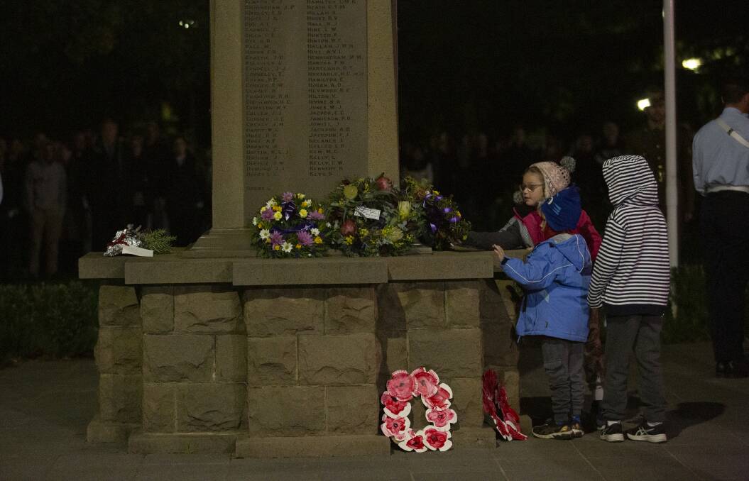 WREATH LAYING: Wagga's littlest residents had the honour of laying wreaths on the cenotaph at Victory Memorial Gardens for the Anzac Day dawn service. Picture: Madeline Begley 