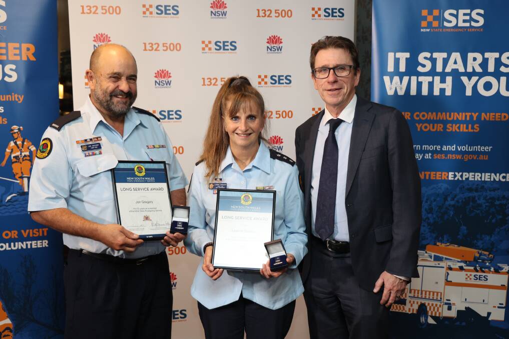 Tumut SES volunteer Jon Gregory with Tumut Unit Commander Leanne Gregory and Member for Wagga Dr Joe McGirr. Picture supplied 