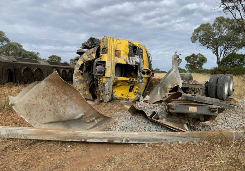 A heavy emergency services presence descend on a level crossing east of Marrar after a truck and freight train collided on Wednesday morning. Picture by NSW Ambulance