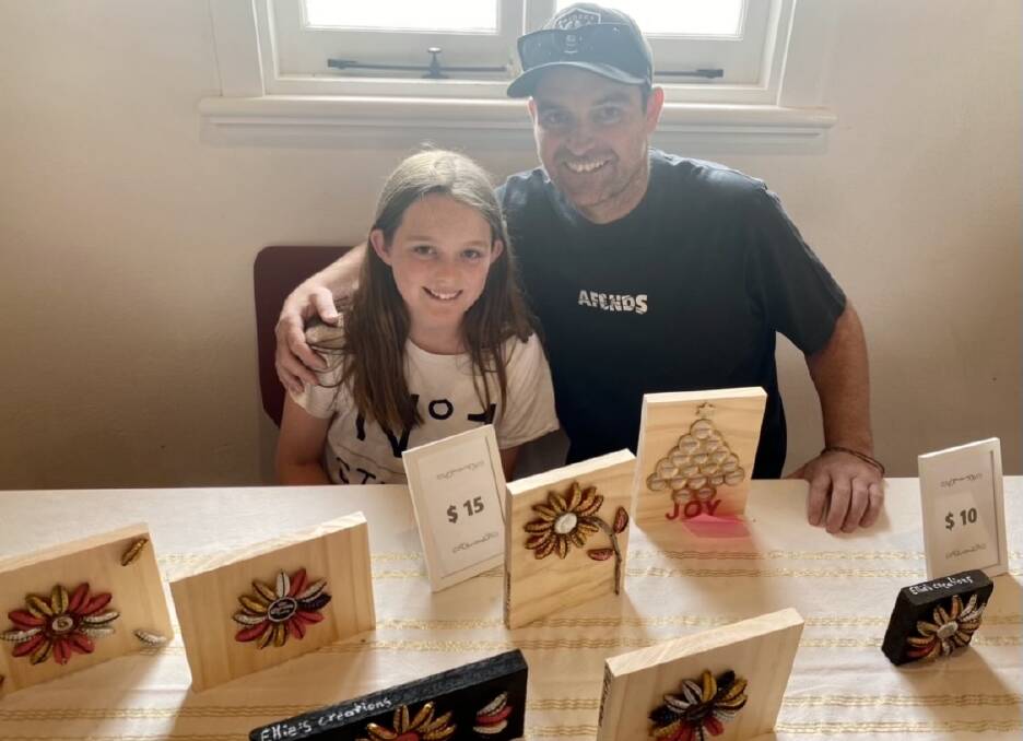 Ellie Rake, 12, with dad Matty Rake perparing for the Oura Markets. Picture supplied