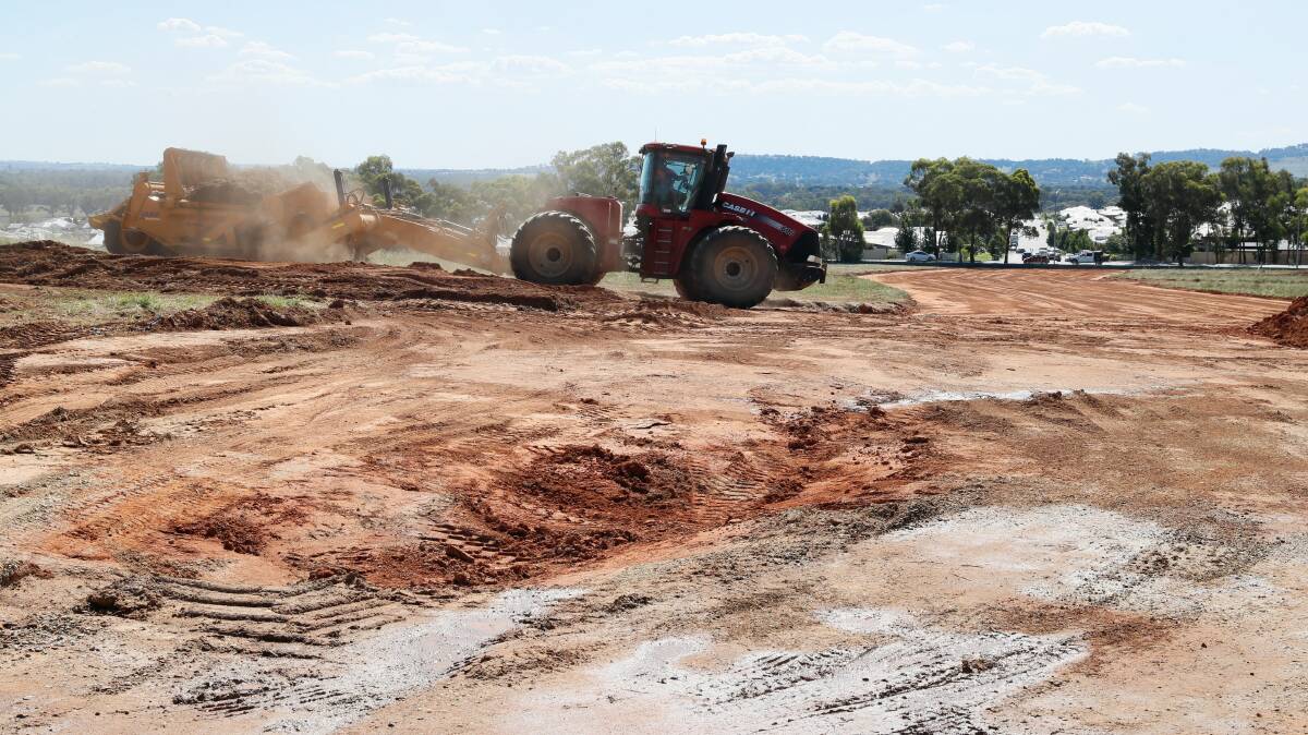 Work to establish two new roads in Estella connecting the suburb to Gobbagombalin is under way at a site off Avocet Drive. Picture by Les Smith 