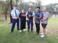 Acting inspector Adam White, Amy Byrom from Mission Australia, senior constable Daniel Callcott, Riverina Police District Aboriginal liaison officer Tyrone Johnson and Anglicare's Mitch Dunn walk to raise awareness of youth homelessness. Picture by Les Smith 
