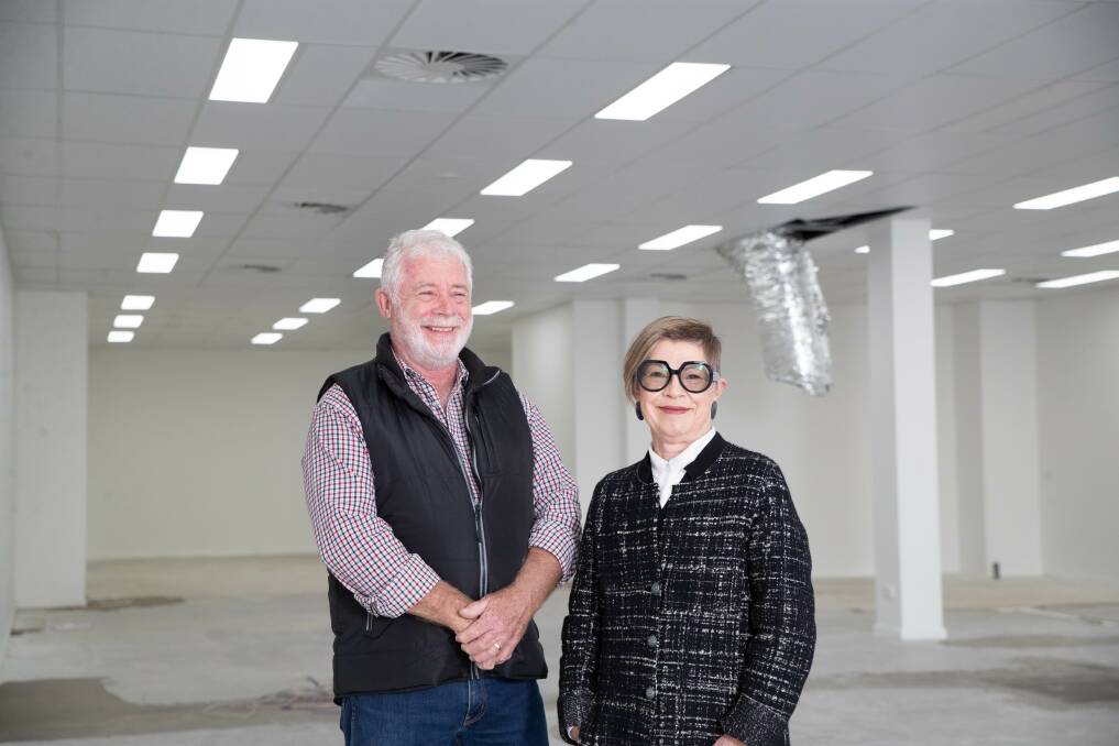 Cootamundra-Gundagai Regional Council mayor Charlie Sheahan and The Coota District Co-Op chair Leigh Bowden in the Parker Street space which is scheduled to open to the community in July. Picture by Madeline Begley