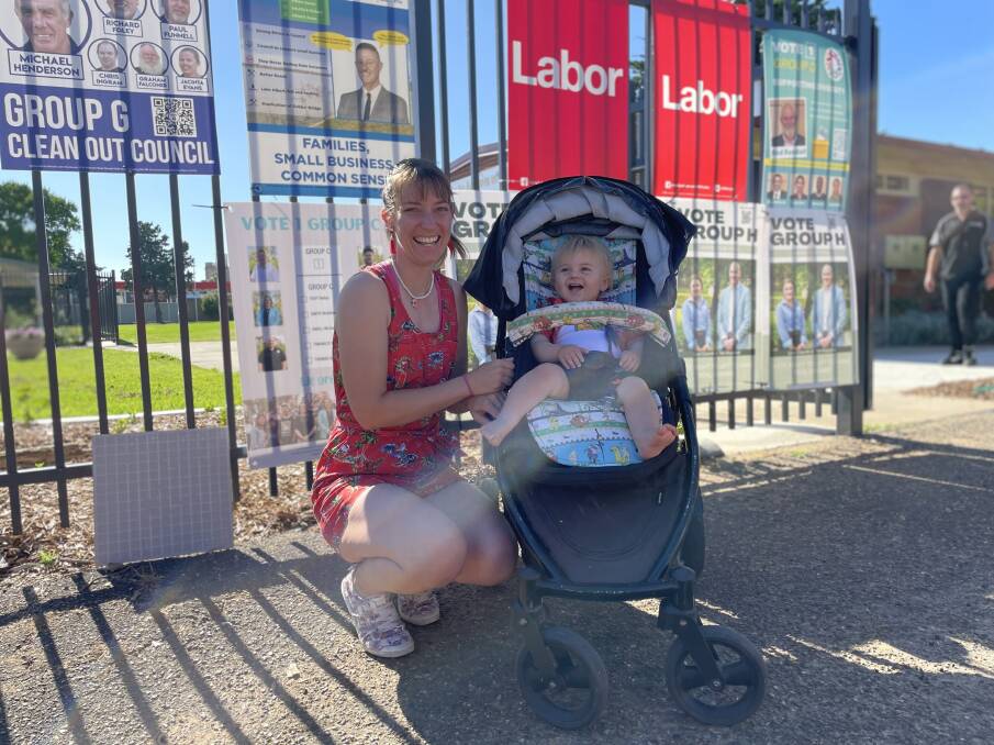 Early morning Group E voter Melissa Nichols with son Jon Nichols at the polling station at South Wagga Public School. Picture: Taylor Dodge