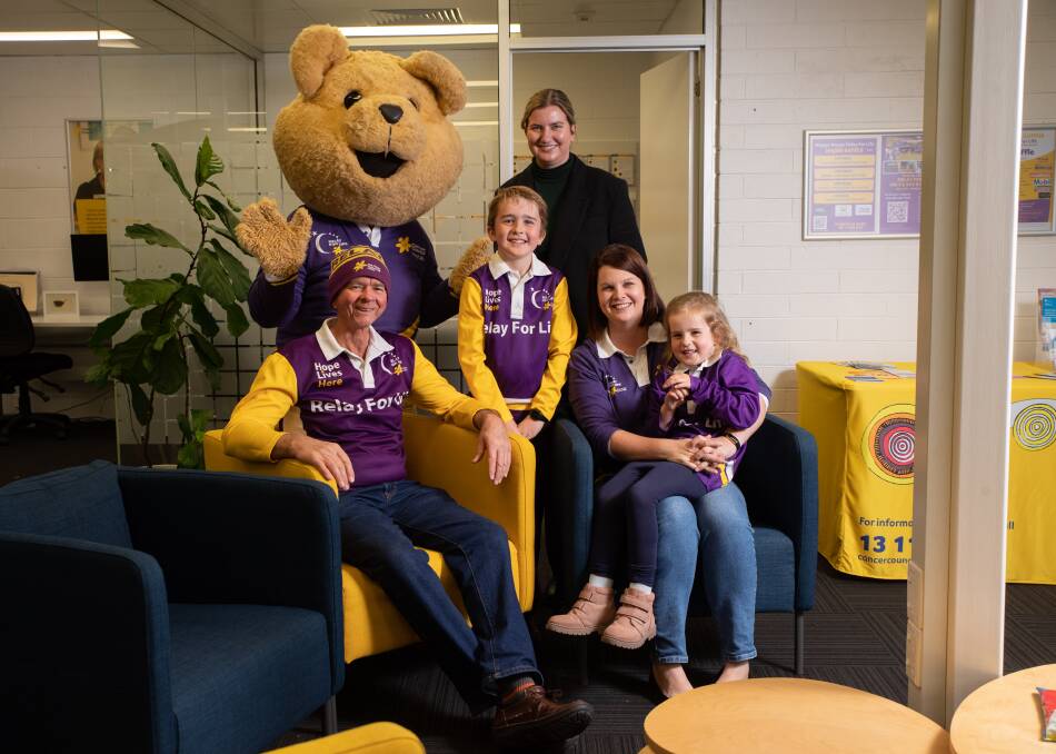 Cancer Council's Dougal Bear, Kate Kiernan, Alan Pottie and Ange Roberts, with her children Riley Roberts, 8 and Izzy Roberts, 6, prepare for the 2023 Wagga Relay for Life. Picture by Madeline Begley