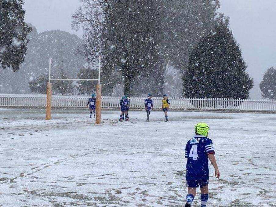 Snow does not stop the Tumut minor league under 8's and Tumbarumba Batlow under 8's from competing. Picture: Supplied 