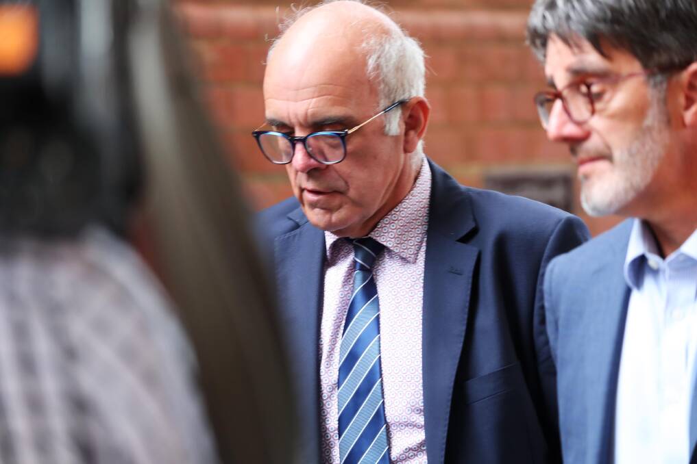 DATE SET: David Edward Blake (on the left) exiting Wagga Court house last month. Picture: Emma Hillier 