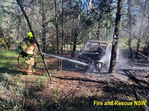 Firefighters battle car blaze at Willians Hill