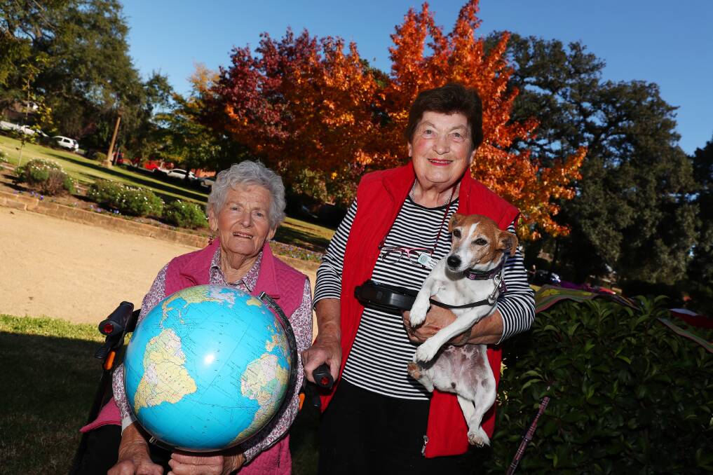 RAISING AWARENESS: June Bahr, Norma Judd, and her dog Spot ready to "walk the globe" with other members of the Country Women's Association. Picture: Emma Hillier 