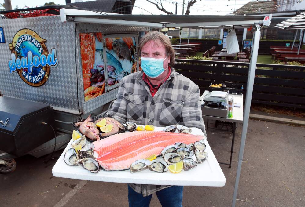 SEAFOOD FEAST: Gary Clark says one of the best parts about running the business is he has made so many friends over the years. Picture: Les Smith 