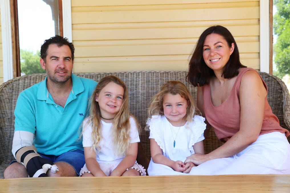 Adam, Stevie, 6, Frankie, 5 and Amanda Symons at their family home in Ganmain. Picture: Emma Hillier 