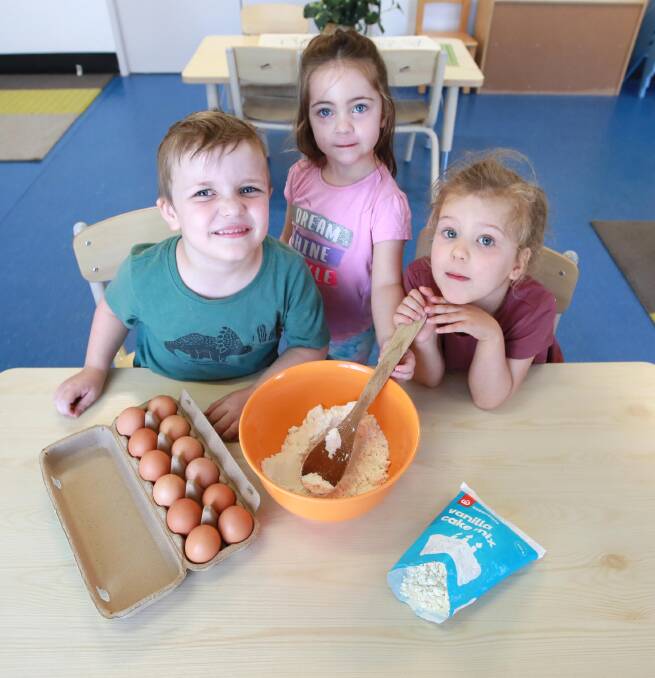 Hudson Lang, Summer-Rose Mellan and Ivy Kliman, all aged 4, are keen to learn how it's done. 