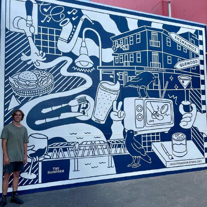 Isaac Ferguson, who grew up in Wagga on Gurwood Street, says it was an honour to paint the mural. Picture: Supplied 
