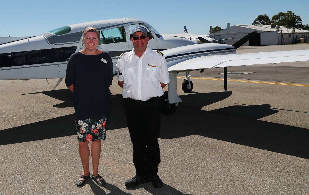 WHEELS UP: Nurse practitioner Danielle Kennedy and Royal Flying Doctor Service pilot Geoffrey McDougall. Picture: Emma Hillier 