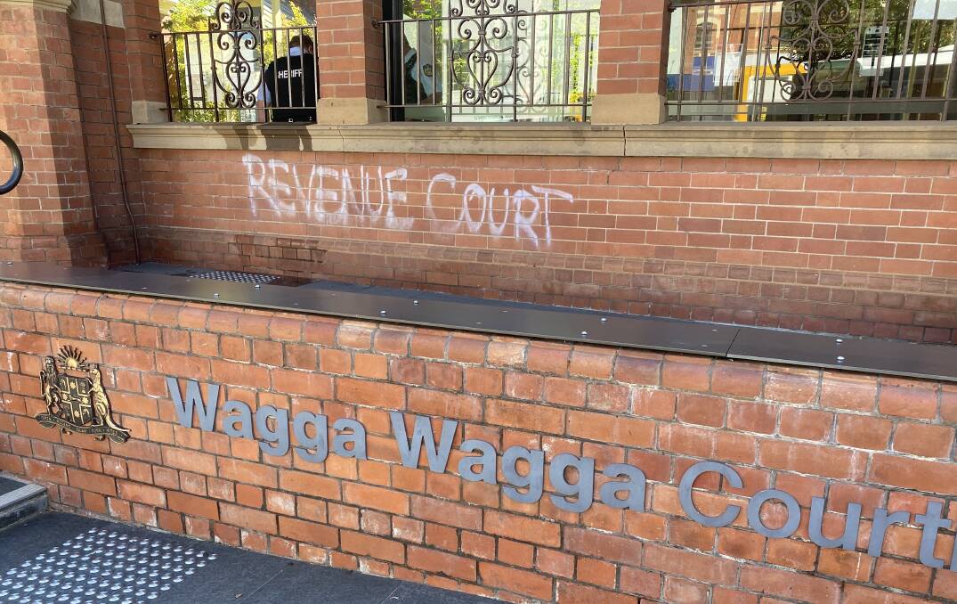 The graffiti was discovered on the outside of the courthouse on Tuesday morning. Picture: Annie Lewis 