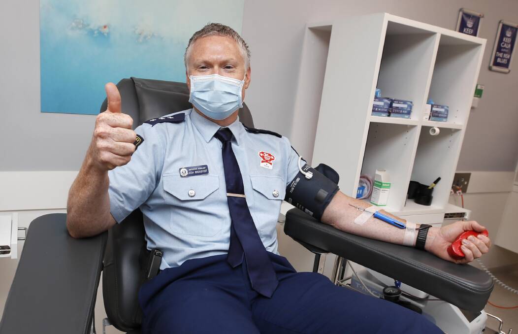 GIFT OF LIFE: Acting Inspector Josh Broadfoot is just one of the officer rolling up his sleeves to donate blood on Friday. Picture: Les Smith 