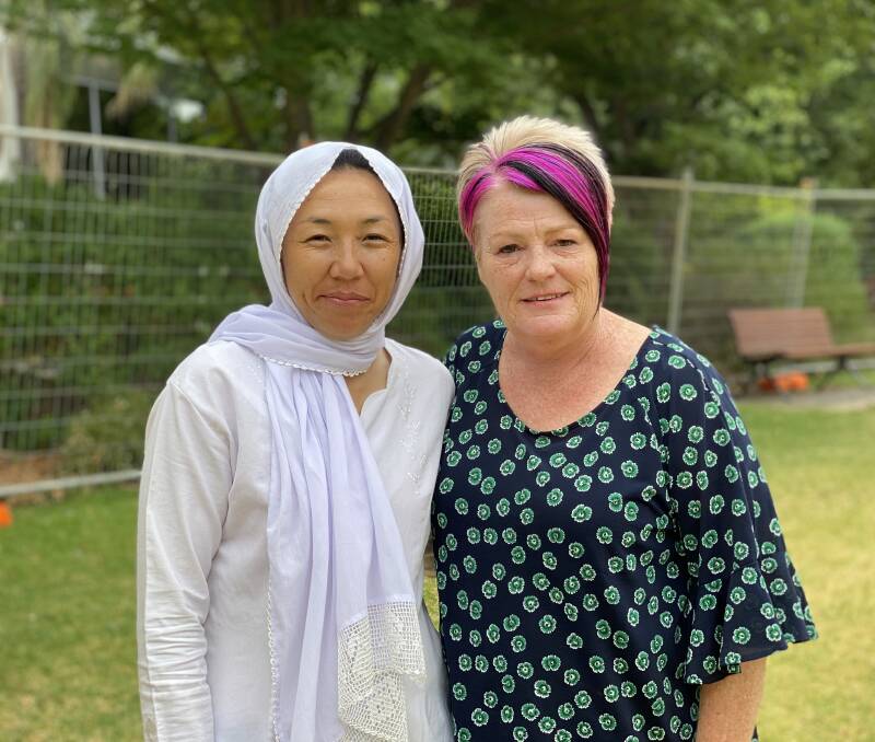 ONE BIG FAMILY: Hakimah Rahimi and Belinda Crain. Ms Rahimi says she is so grateful to have met Ms Crain when she moved to Wagga. Picture: Annie Lewis 